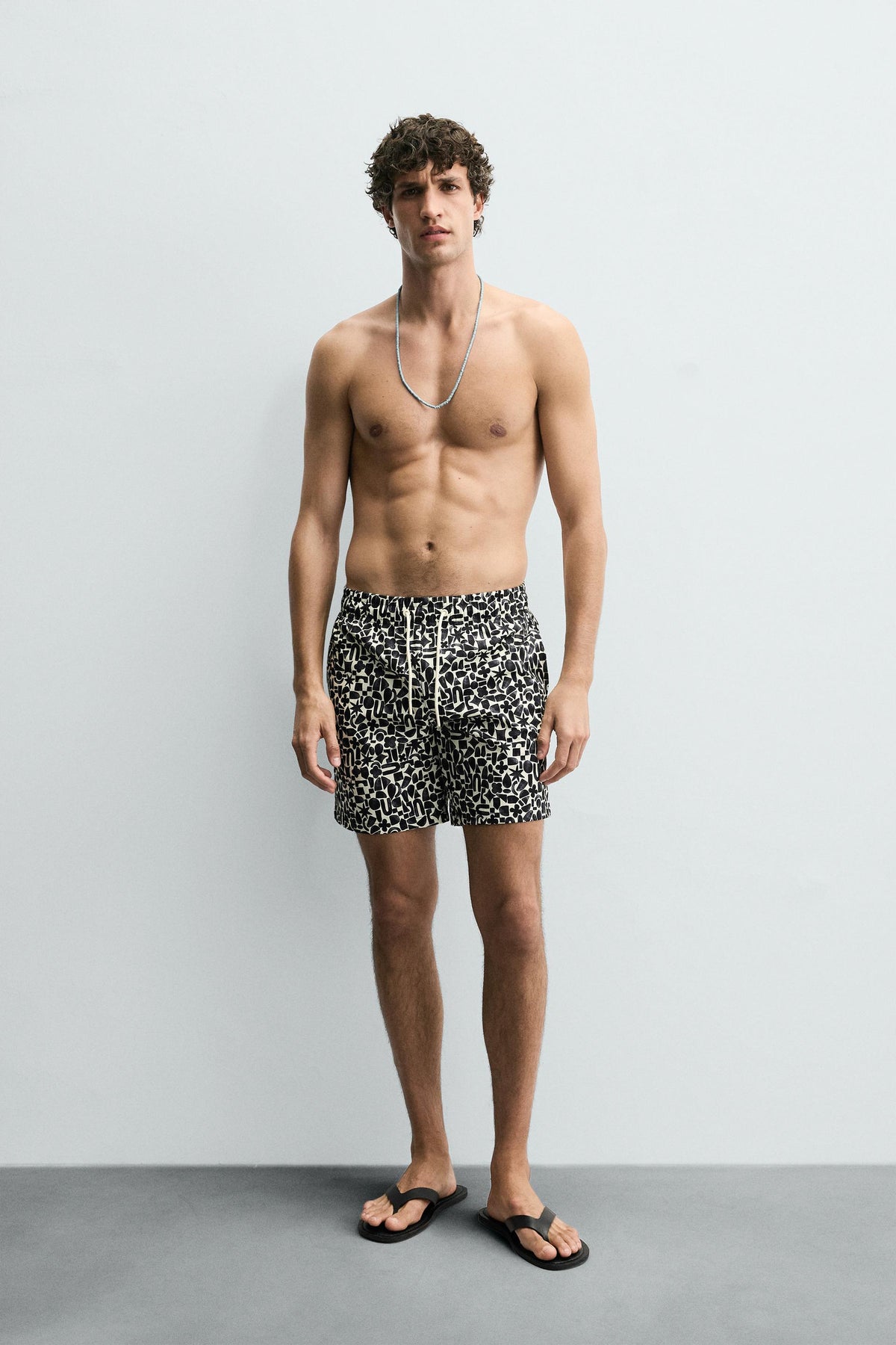 GEOMETRIC PRINT LONG SWIMMING TRUNKS - Image 1