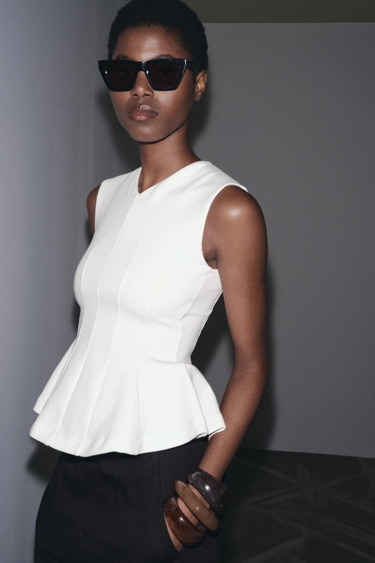Sleeveless Peplum Top