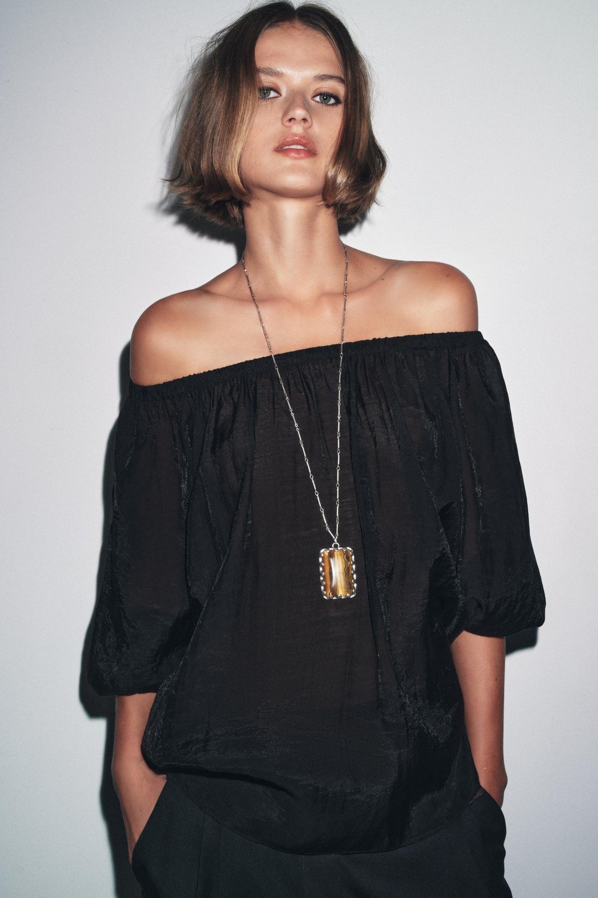 Off-the-shoulder knit top