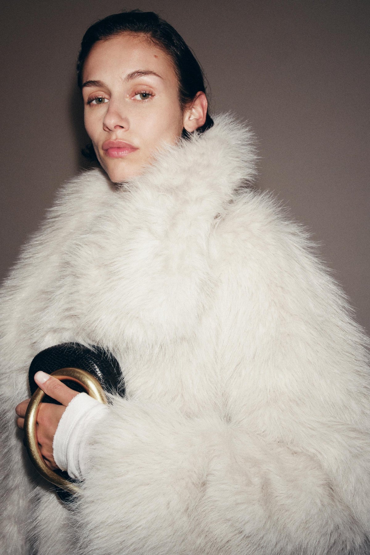 EMBOSSED CLUTCH