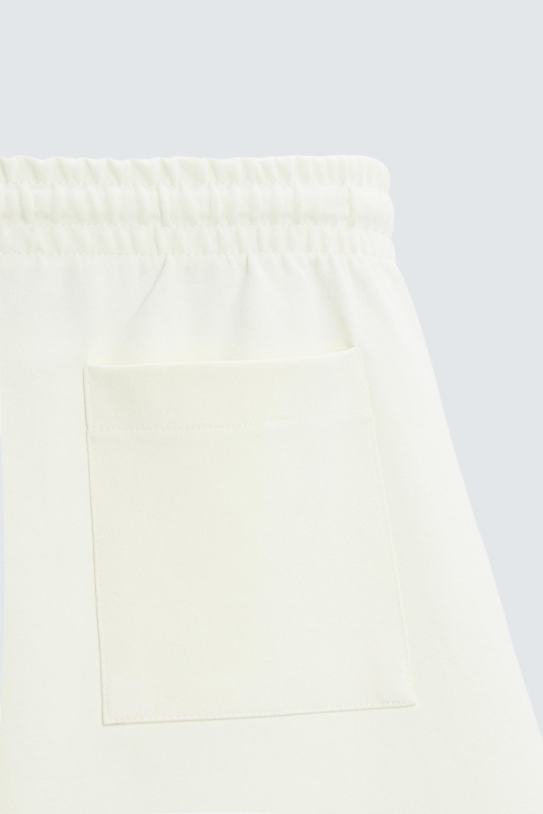 TECHNICAL INTERLOCK BERMUDA SHORTS - Image 9