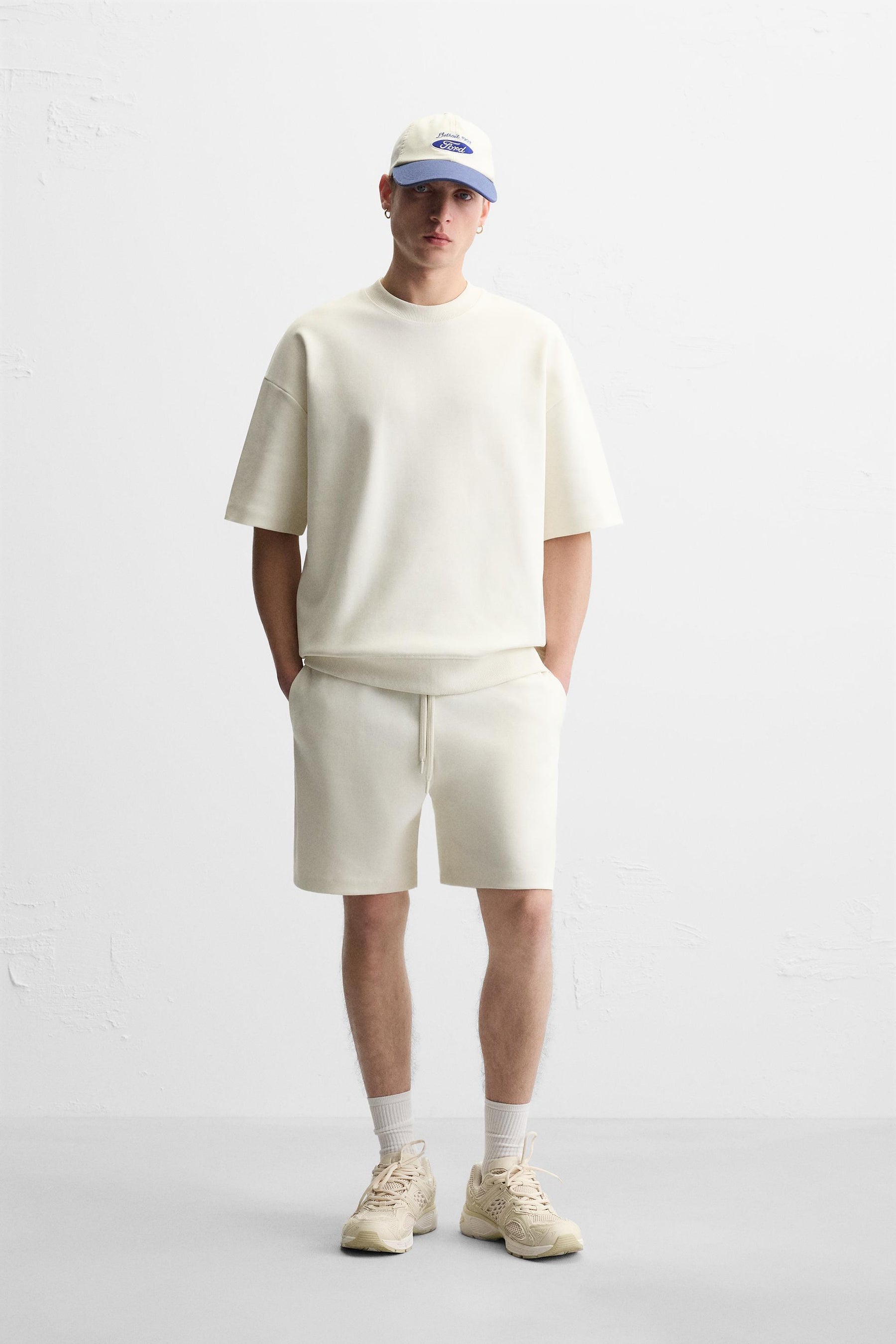 TECHNICAL INTERLOCK BERMUDA SHORTS - Image 1