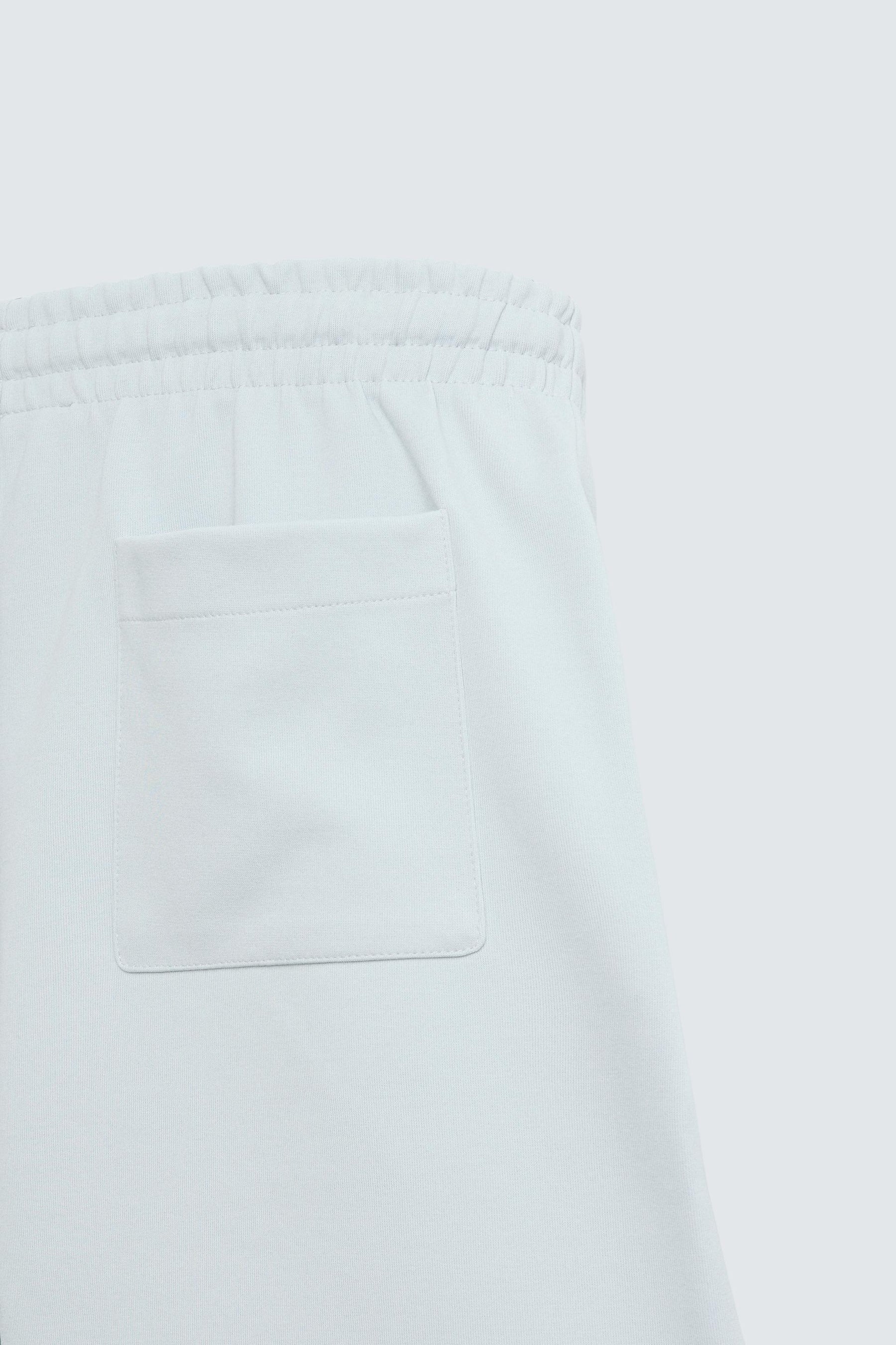 TECHNICAL INTERLOCK BERMUDA SHORTS - Image 9