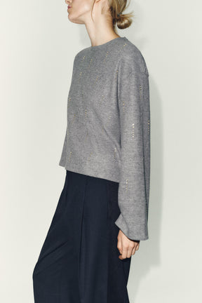 Glitzernder Rippenpullover