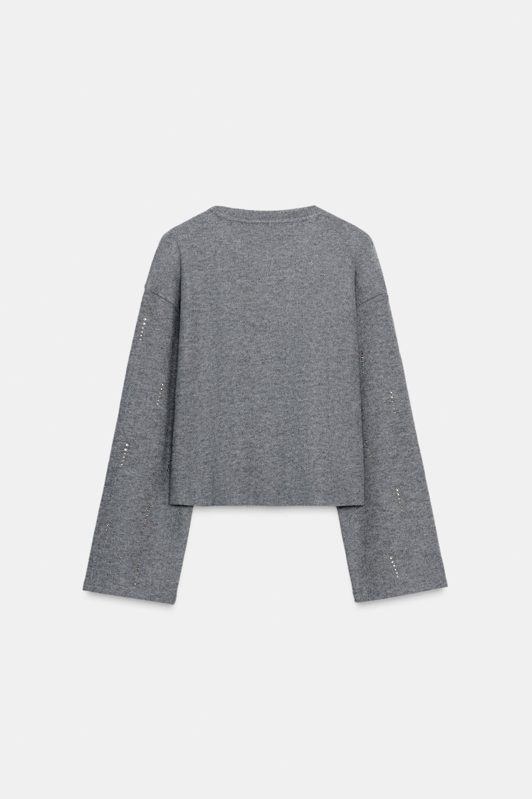 Glitzernder Rippenpullover