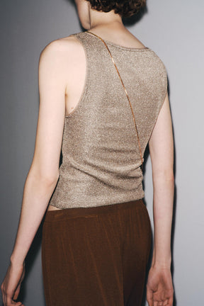 Textured metallic thread top