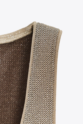 Textured metallic thread top