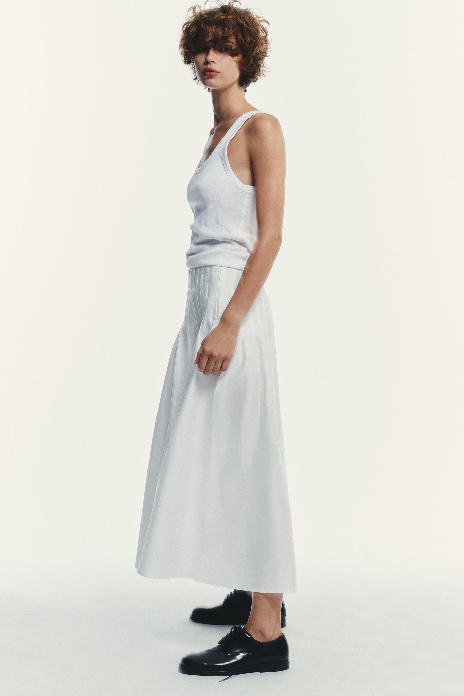 PLEATED MIDI SKIRT