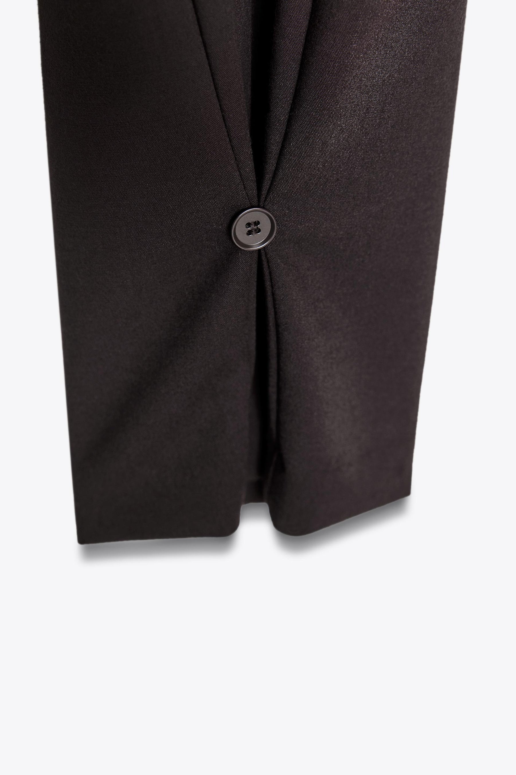 Pleated Trousers with Hem