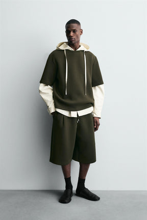 NEOPRENE-EFFECT BERMUDA SHORTS WITH DARTS - Image 1