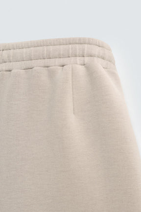 NEOPRENE-EFFECT BERMUDA SHORTS WITH DARTS - Image 8