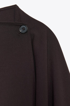 ASYMMETRIC BUTTON CAPE