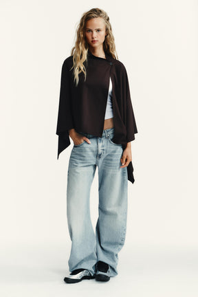 ASYMMETRIC BUTTON CAPE