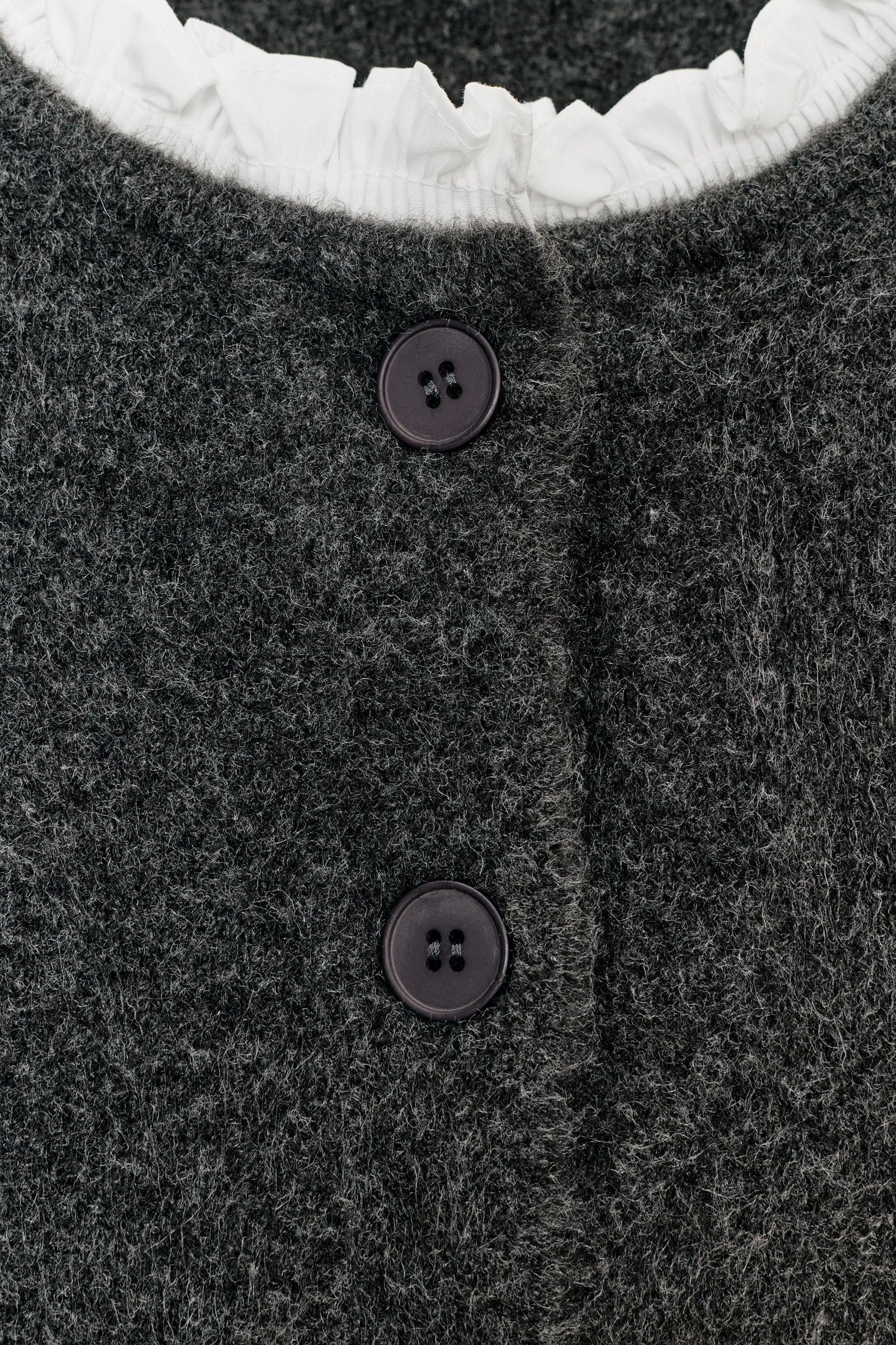 Kontrastfarbene Popeline-Strickjacke
