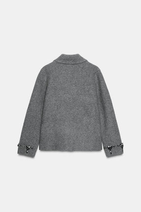 Perlenbesetzte Strickjacke