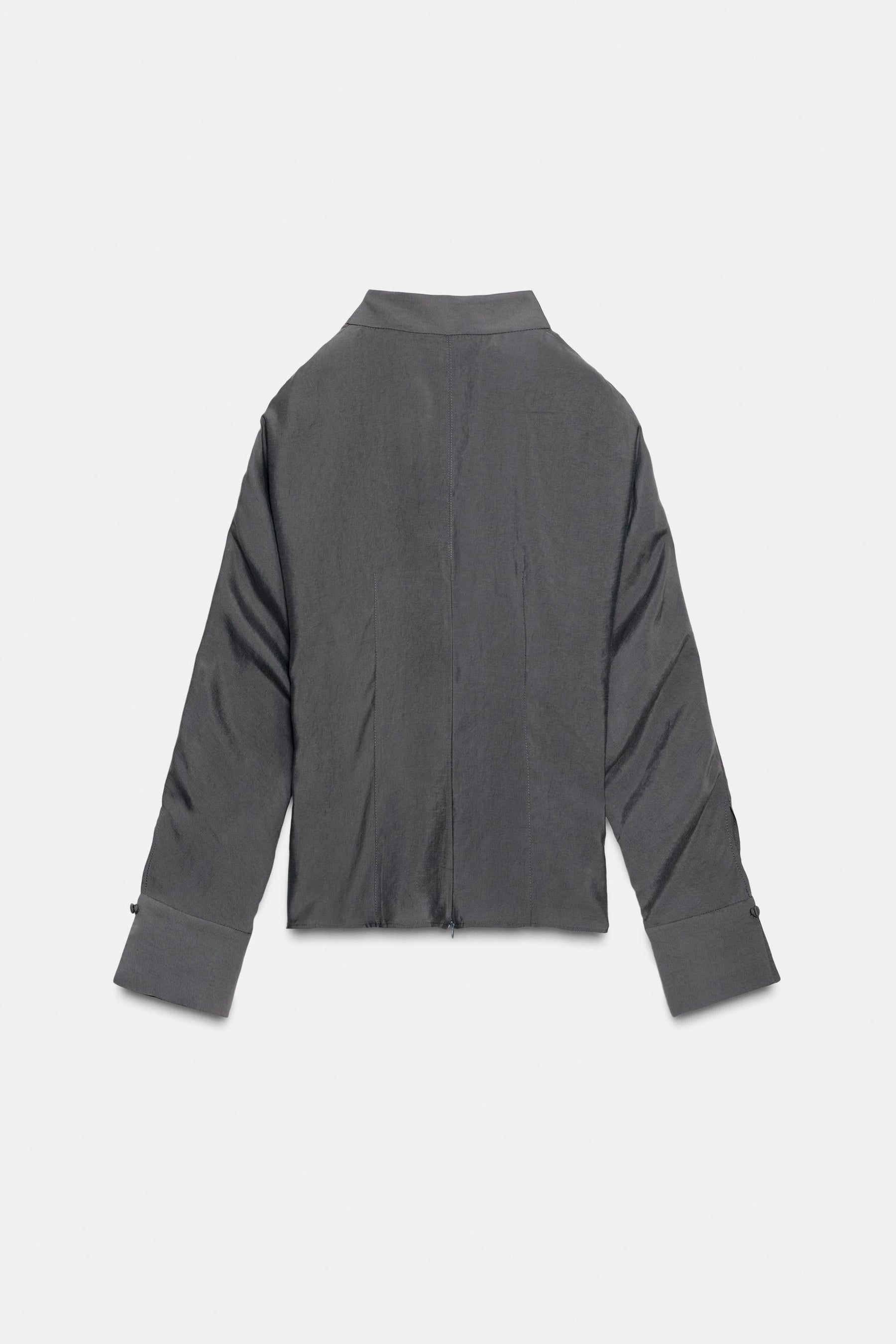 Shoulder-opening bow blouse