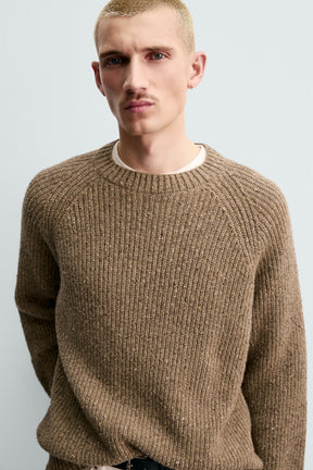 Strickpullover mit Knöpfen