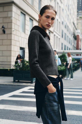 Cardigan mit Kunstpelzrevers