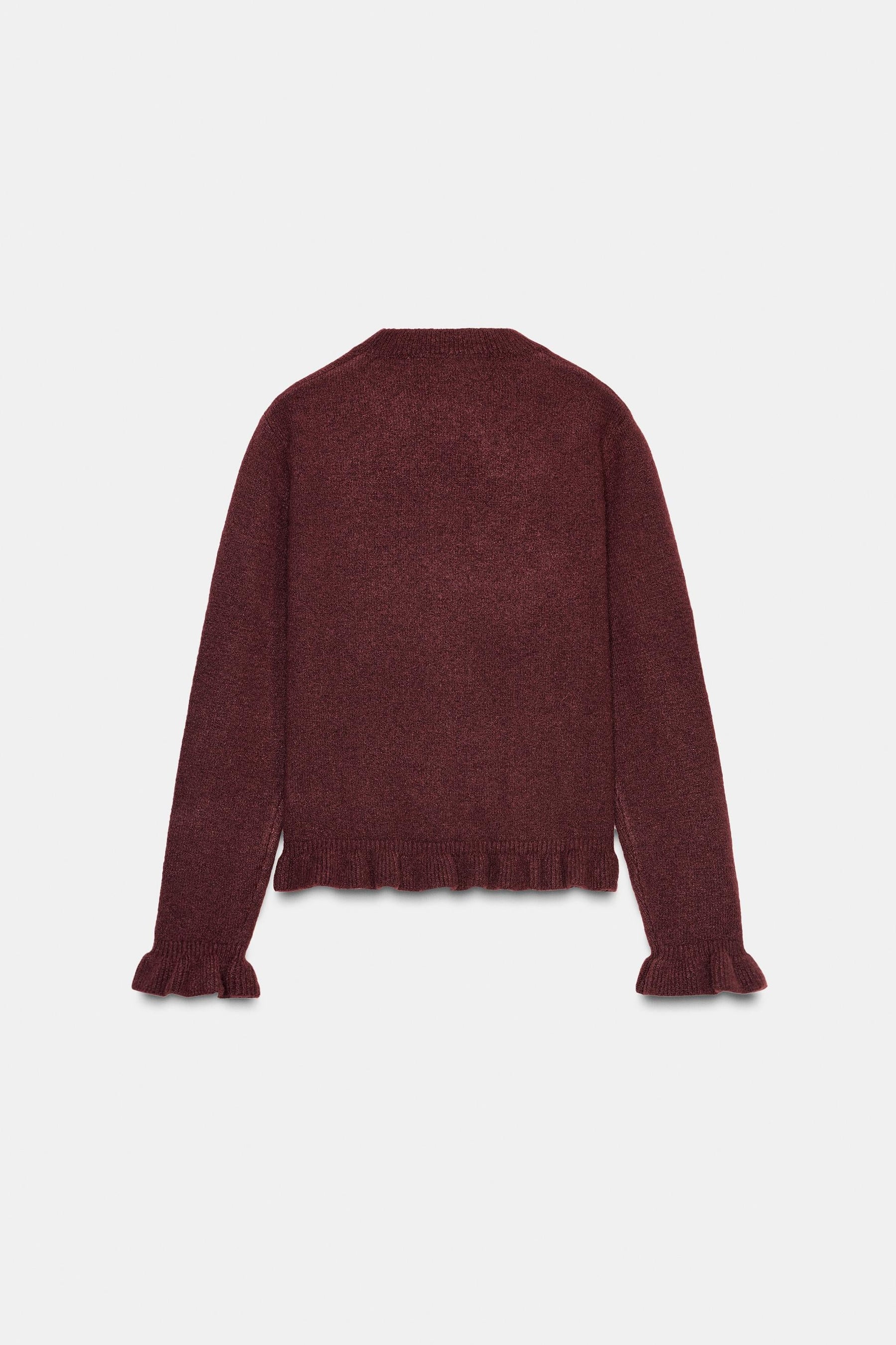 Rüschenstrickjacke