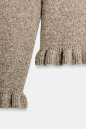Strickjacke mit Rüschenbesatz