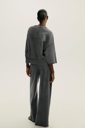 WASHED EFFECT TROUSERS
