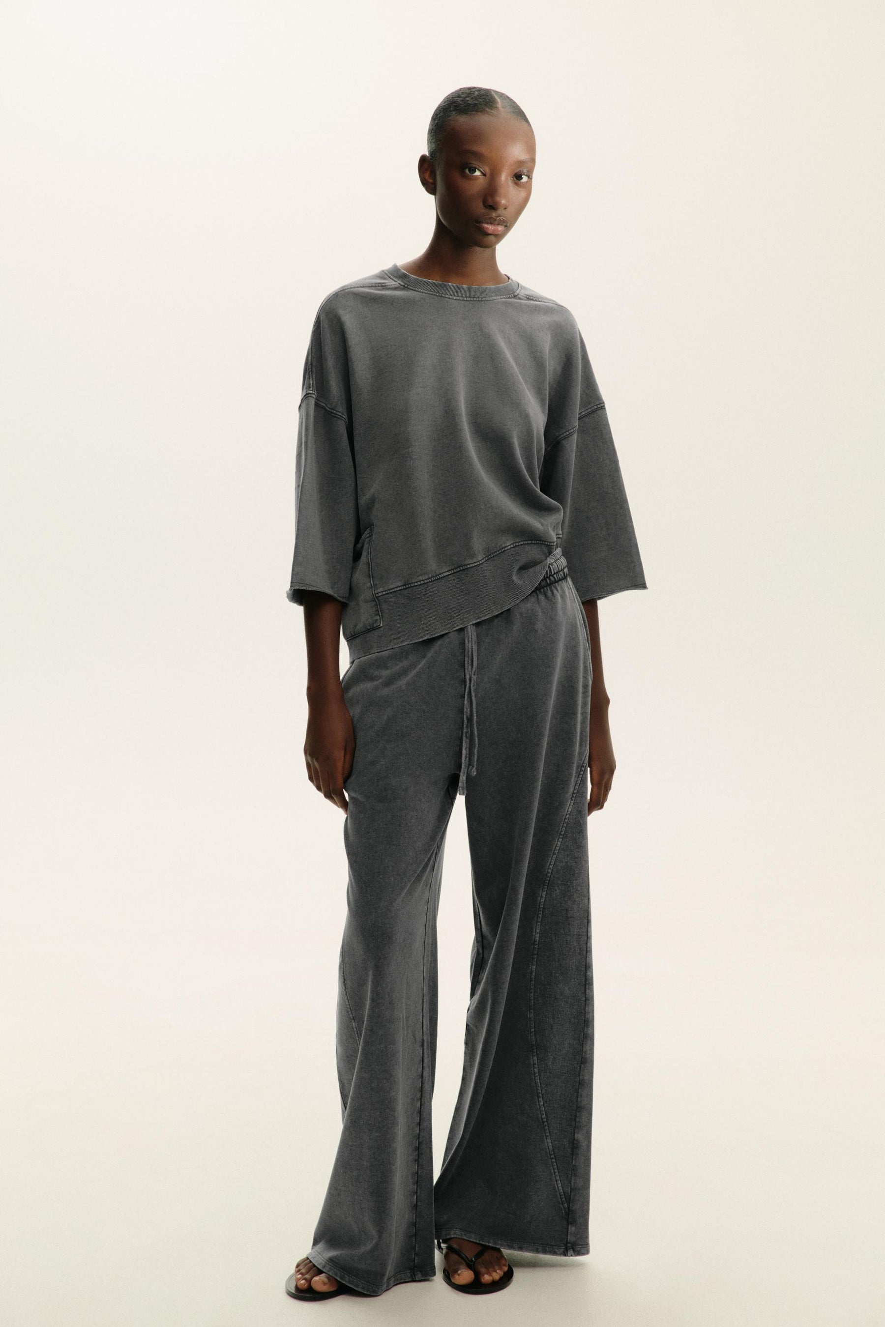 WASHED EFFECT TROUSERS