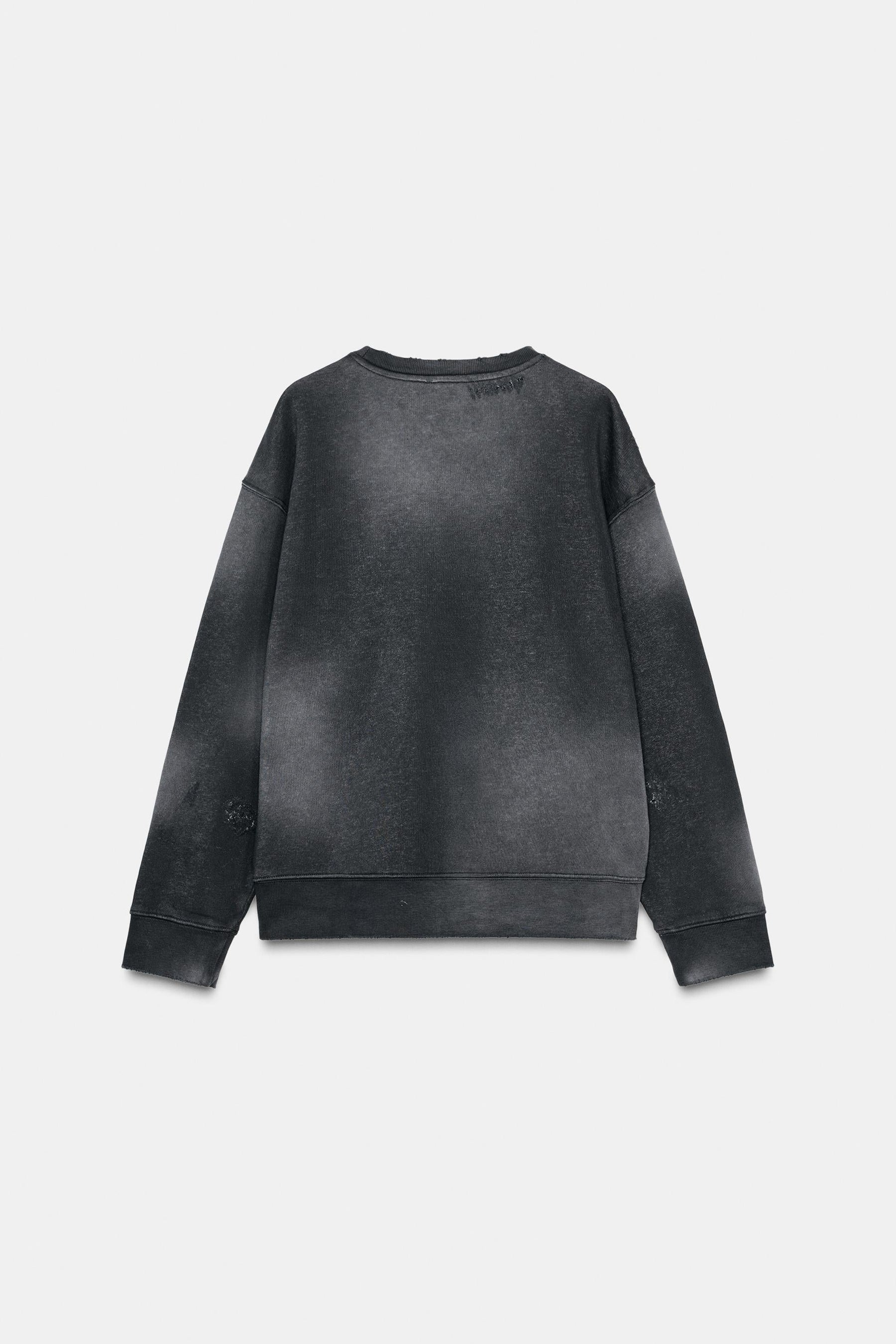 Ripped Faded Sweatshirt