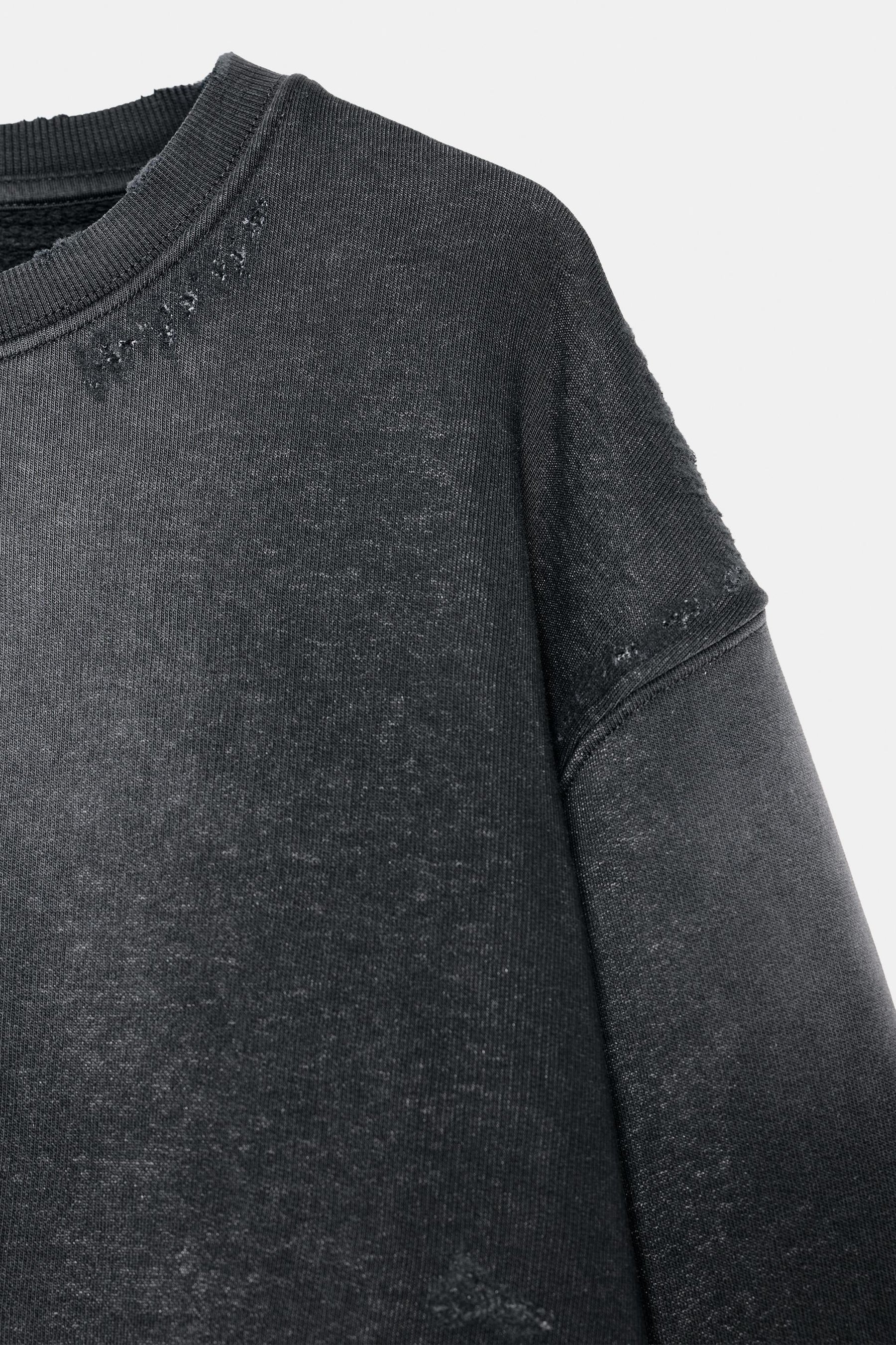 Ripped Faded Sweatshirt