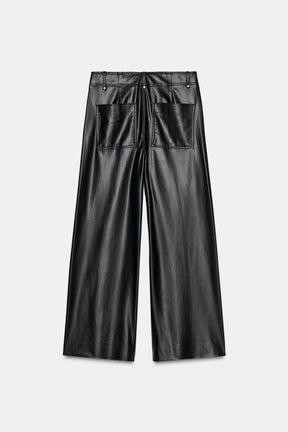 Tailored wide-leg leather-effect trousers.