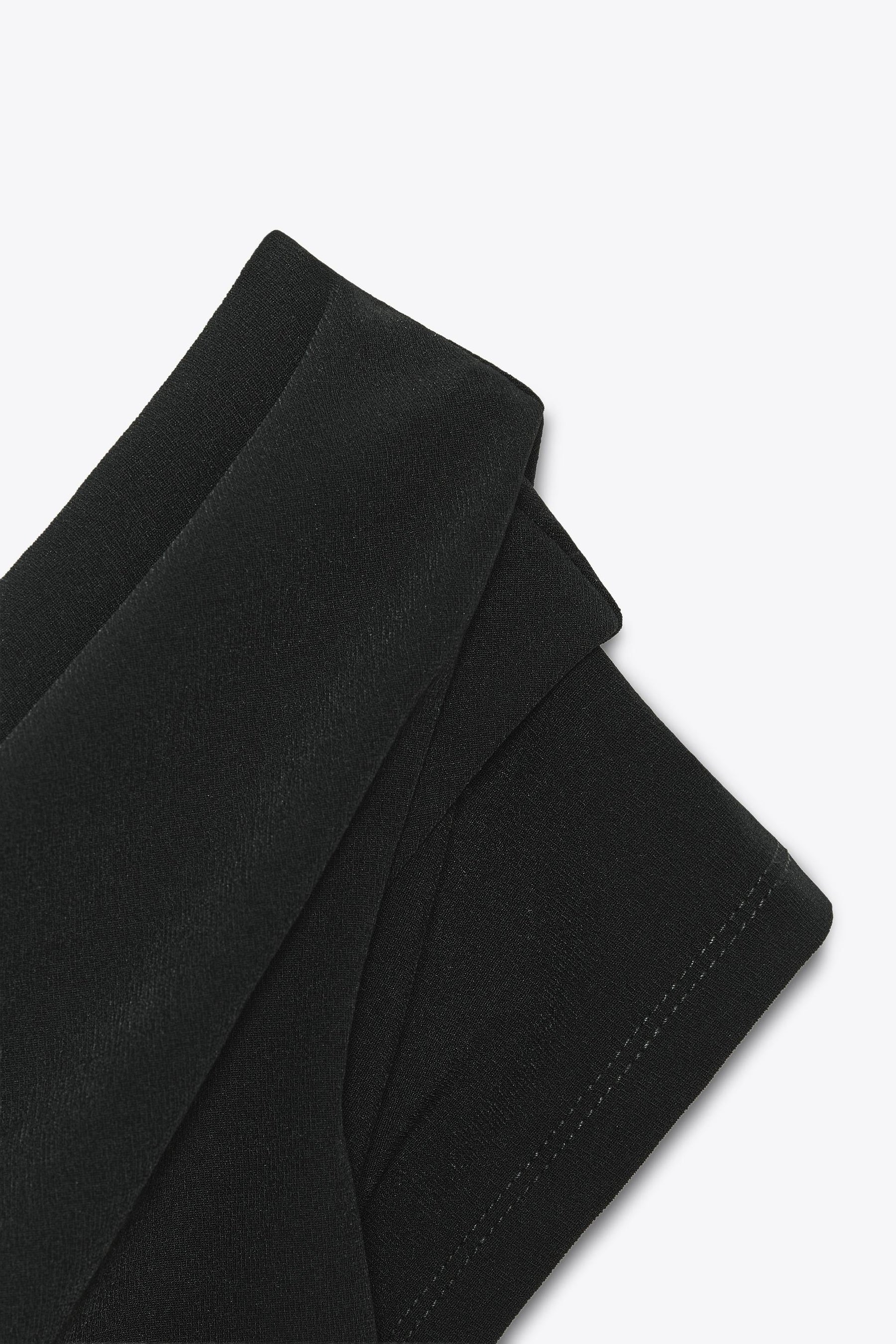 Asymmetric Gathered Top