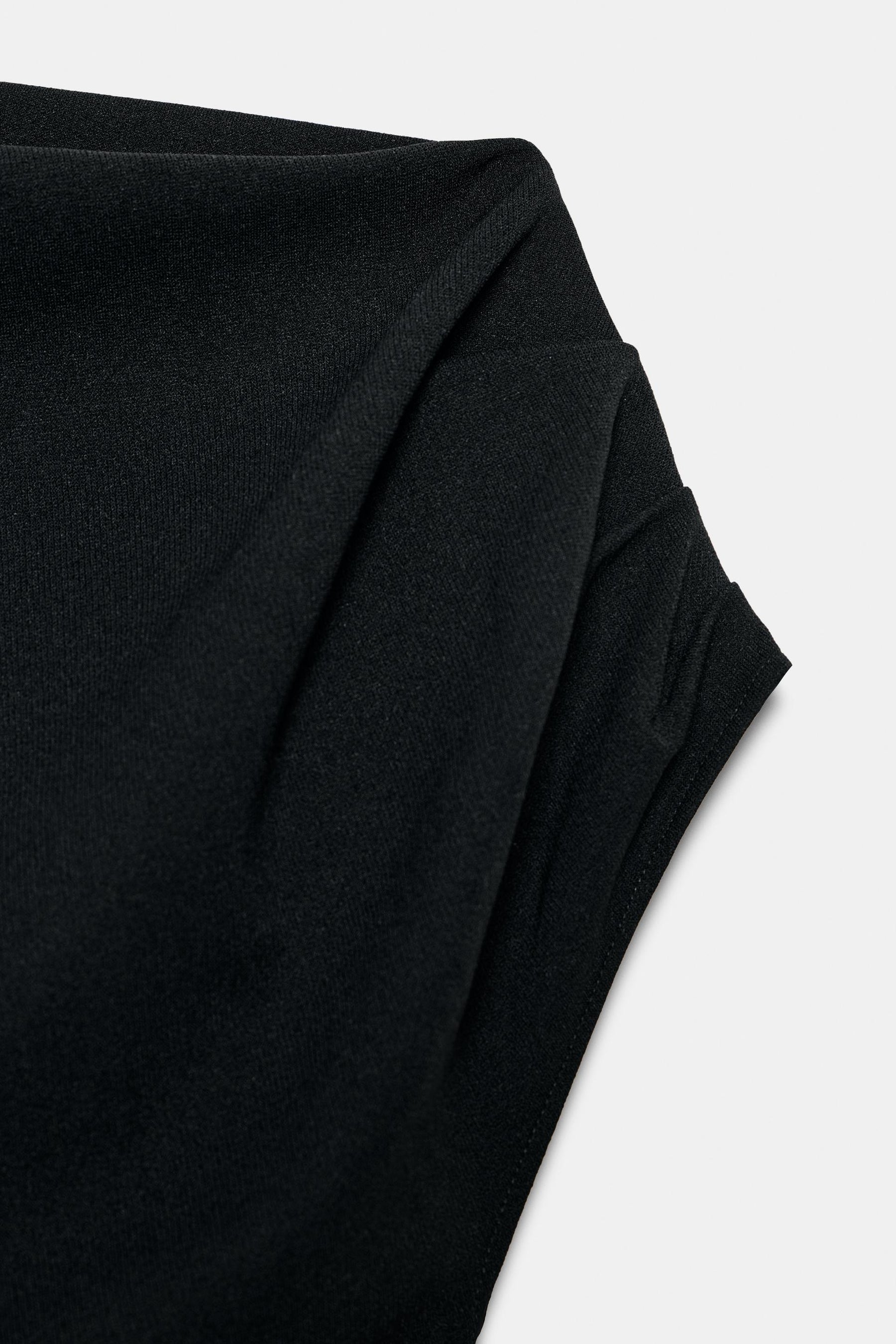 Pleated Asymmetric Top
