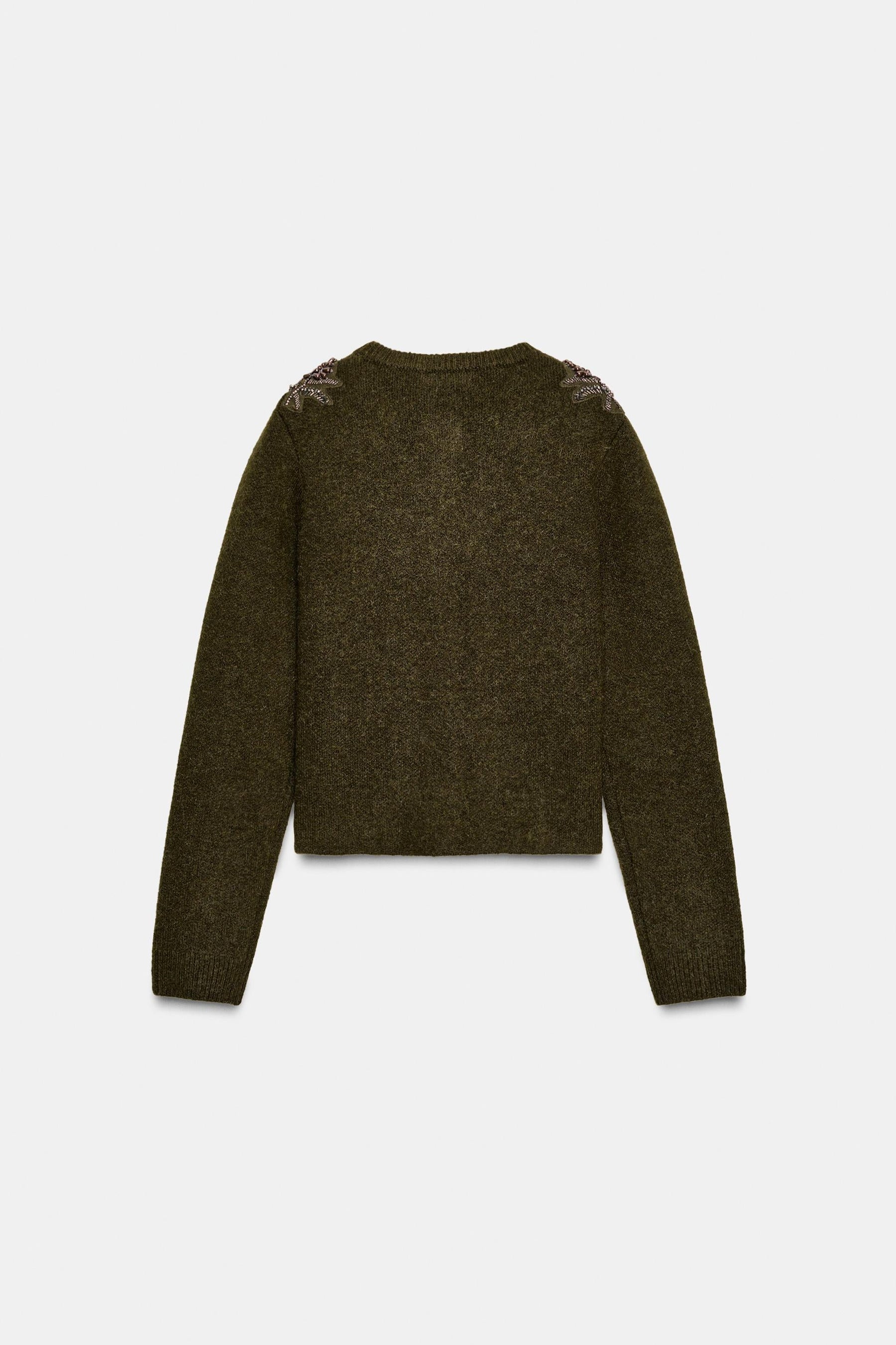 Perlenbesetzte Strickjacke