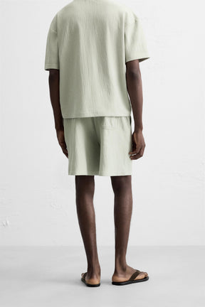 TEXTURED JOGGER BERMUDA SHORTS - Image 3