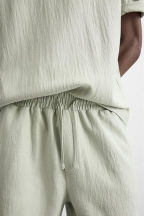 TEXTURED JOGGER BERMUDA SHORTS - Image 5
