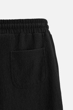 TEXTURED JOGGER BERMUDA SHORTS - Image 9