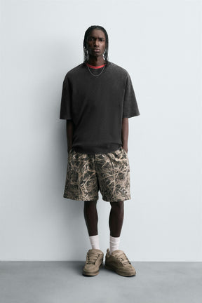 ABSTRACT PRINT BERMUDA SHORTS - Image 1