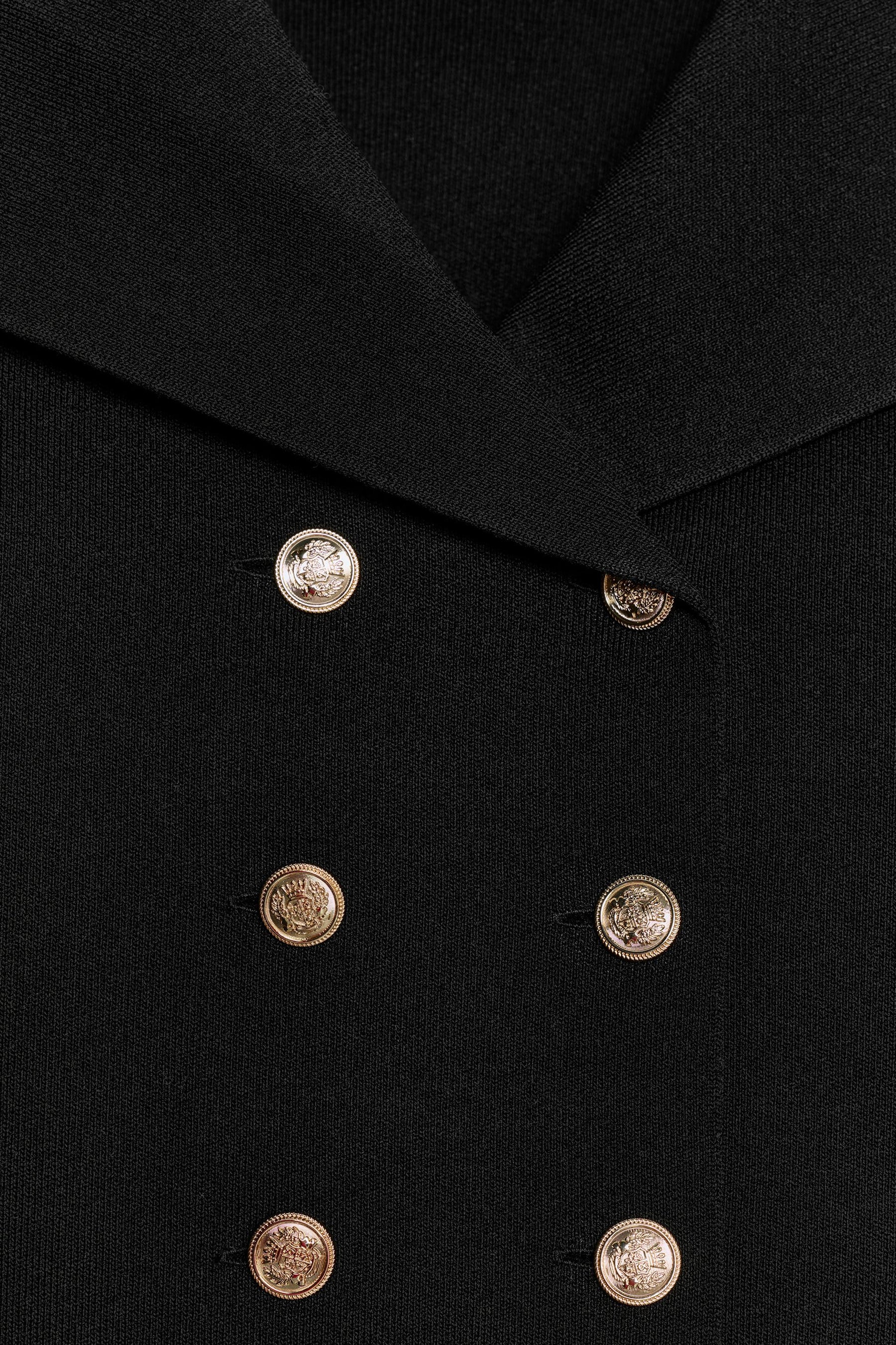 Kurze Strickjacke