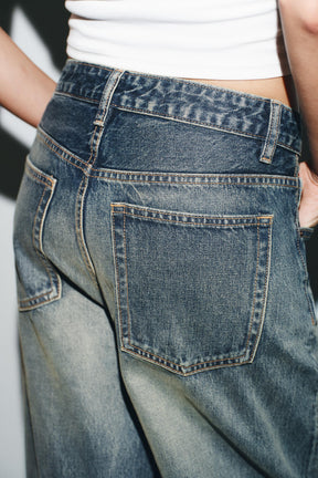 Ripped mid-waist folded jeans