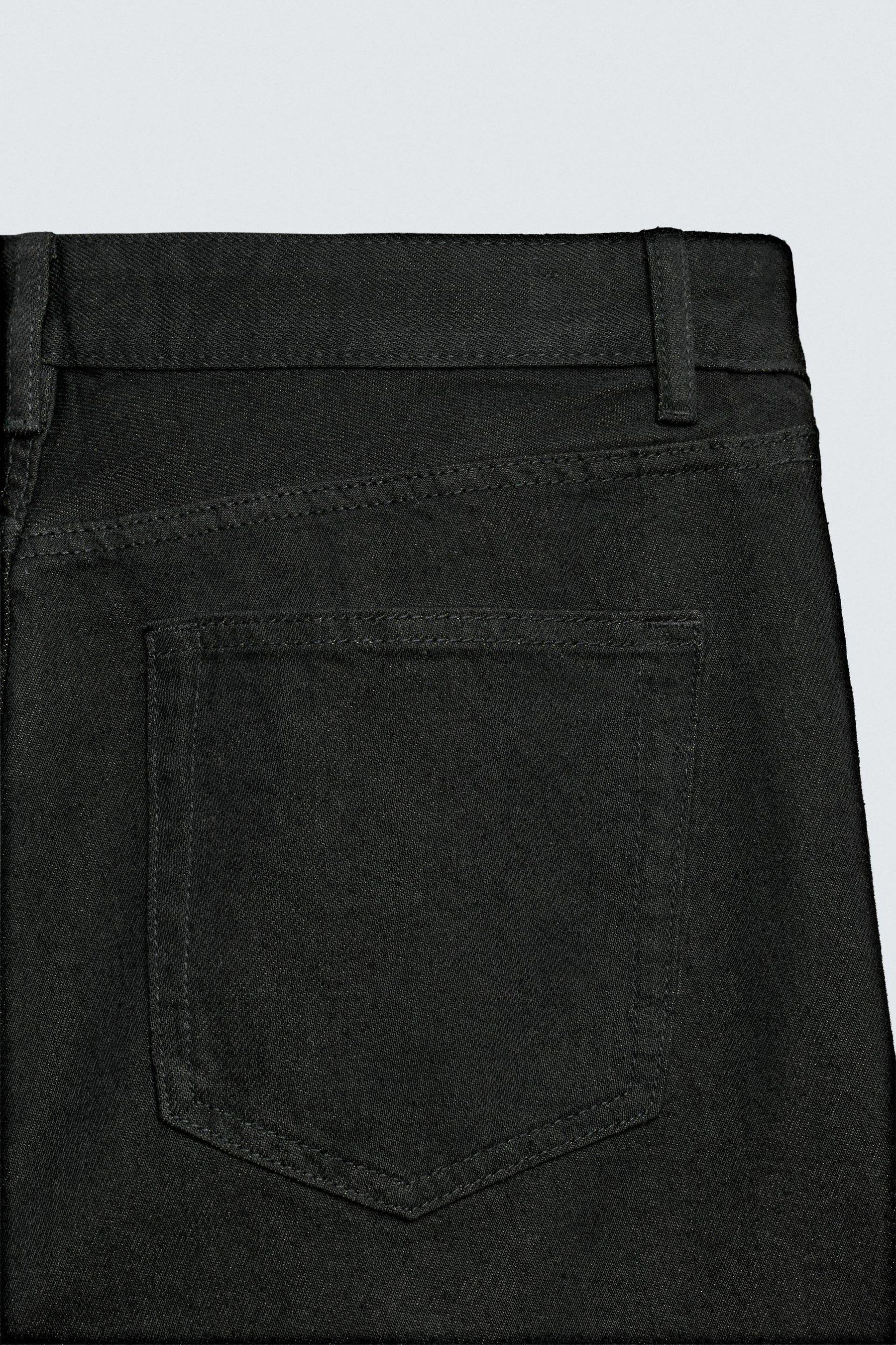 FLARE FIT JEANS WITH STUDS - Image 10