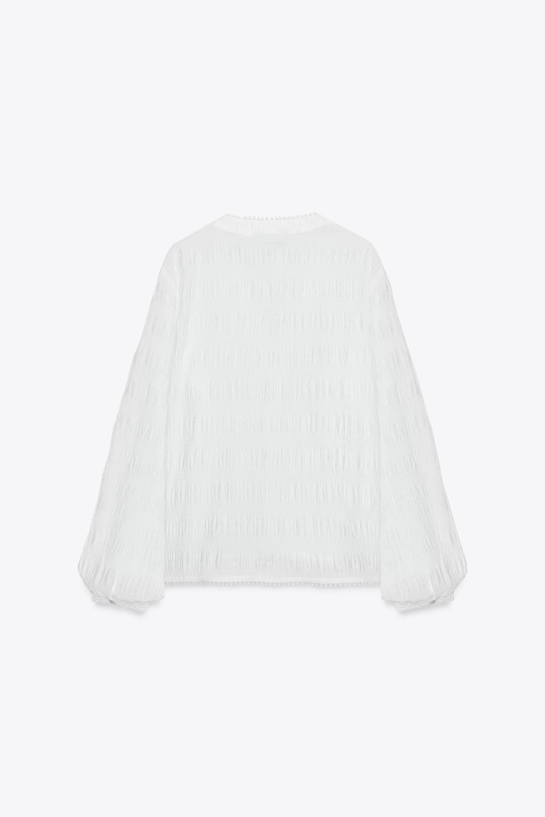 Bluse mit Spitzenbesatz