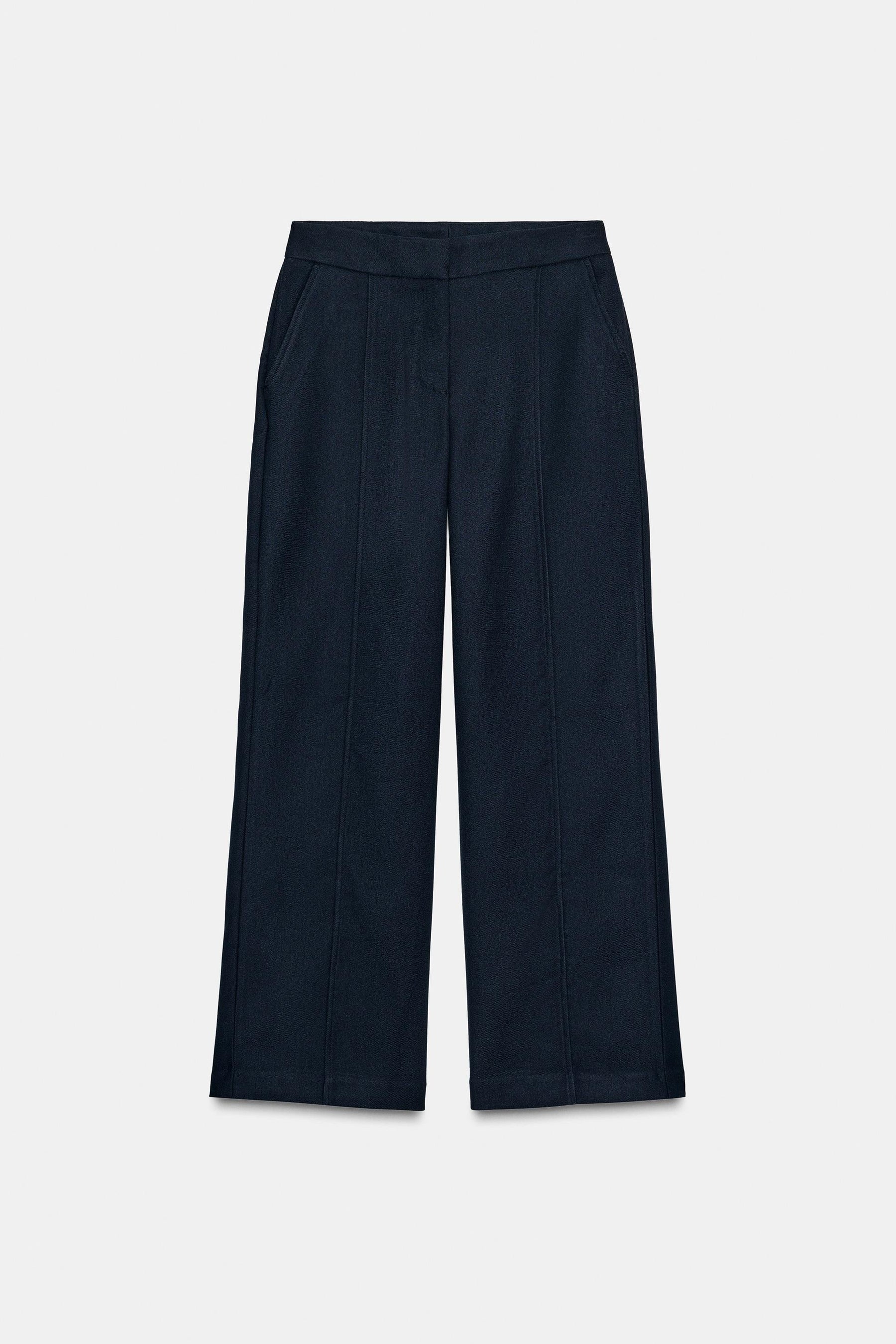 Straight-leg trousers with detail.