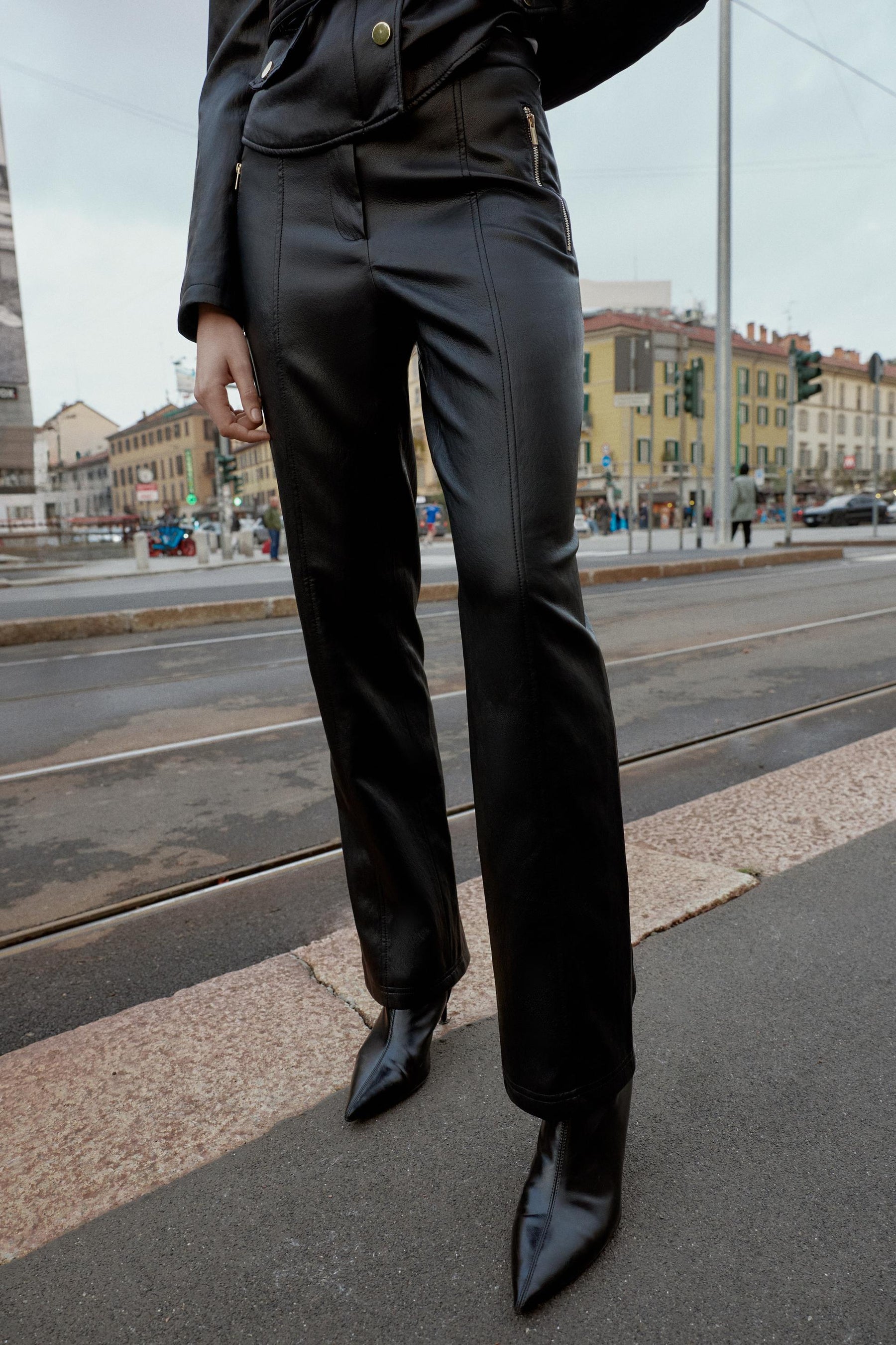 FLARE FAUX LEATHER TROUSERS