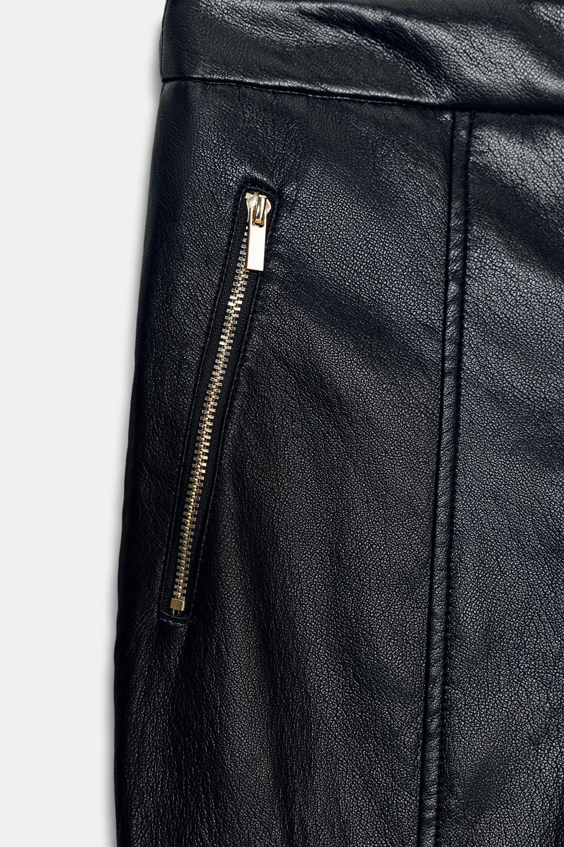 FLARE FAUX LEATHER TROUSERS