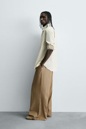 STRIPED OVERSIZE FIT TROUSERS - Image 4