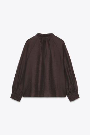 Transparente Bluse mit Puffärmeln