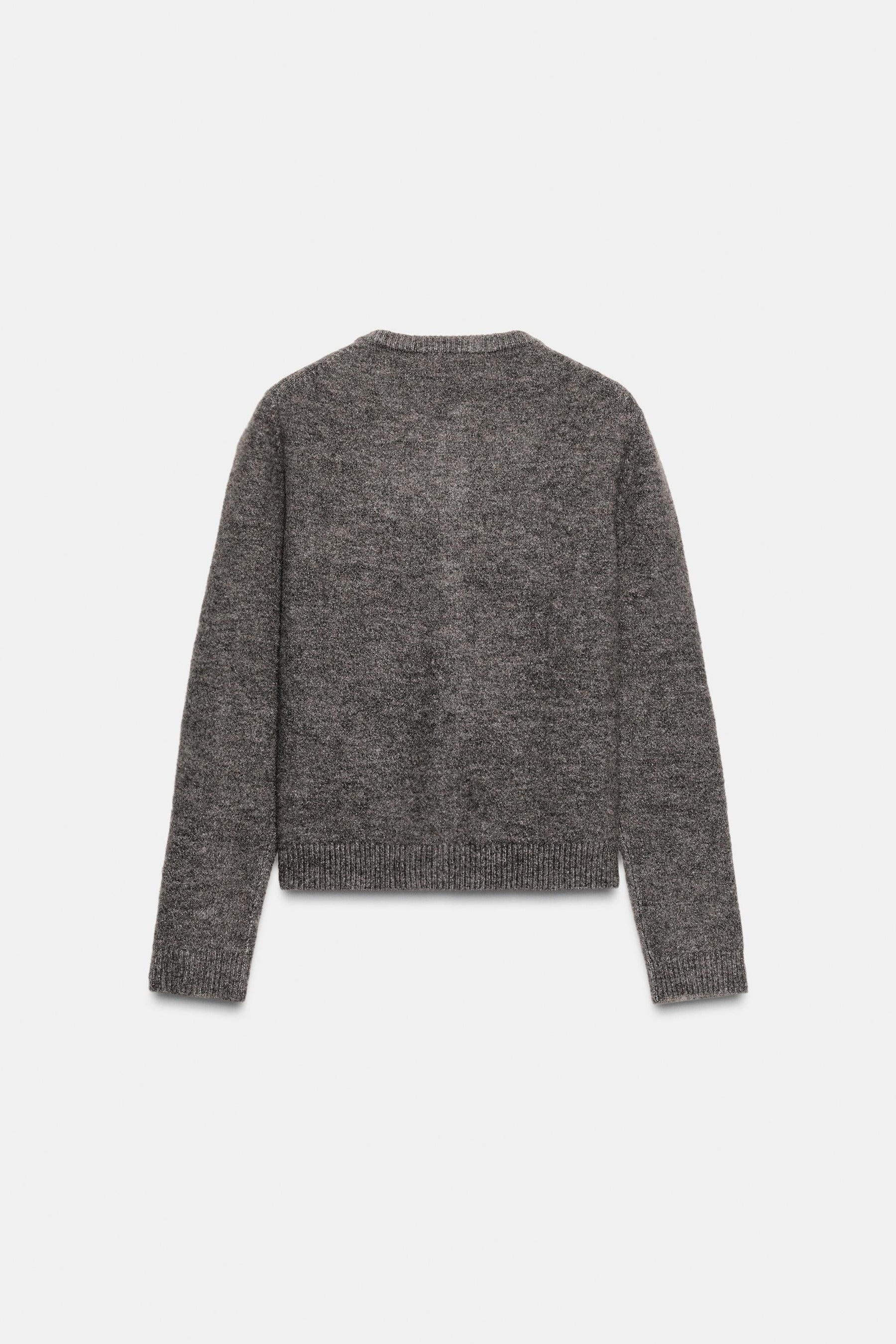 Strickjacke mit Metallknöpfen
