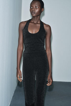 Shiny stretch halter top.