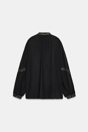 Perlenbesetzte, halbtransparente Bluse