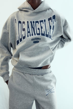 SLOGAN HOODIE