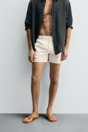 CONTRAST MID-LENGTH SWIMMING TRUNKS - Image 2